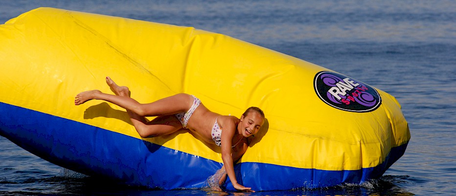 Every period in the day is an adventure with activities such as our 30 foot climbing walls, 100 foot Water Slides, Tarzan Swing, Gyro, Archery, Trampoline, Tubing, Sauna, plus many more!