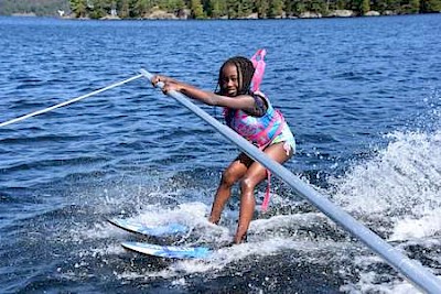 Young girl water skiing at lake temagami