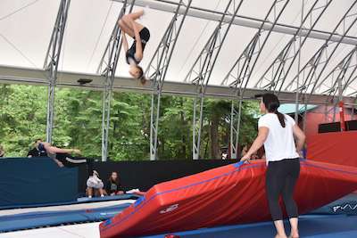 girl performing backflip while trampolining at Canadian Adventure Camp